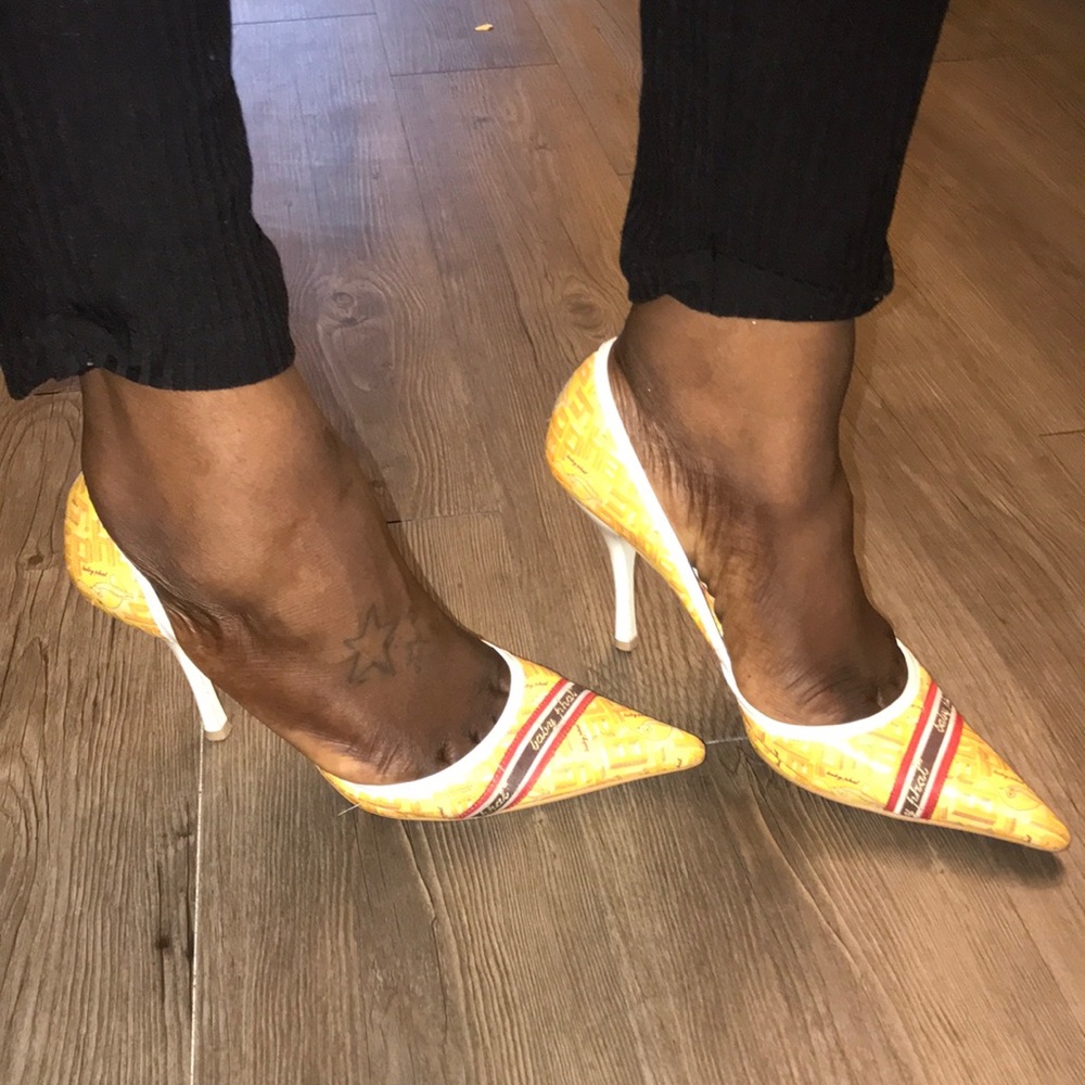 Yellow brown and red baby phat pumps
